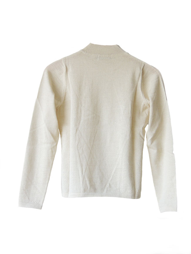 Classic sweaters in solid cream white, conducted in luxury super soft baby alpaca, with round neck.