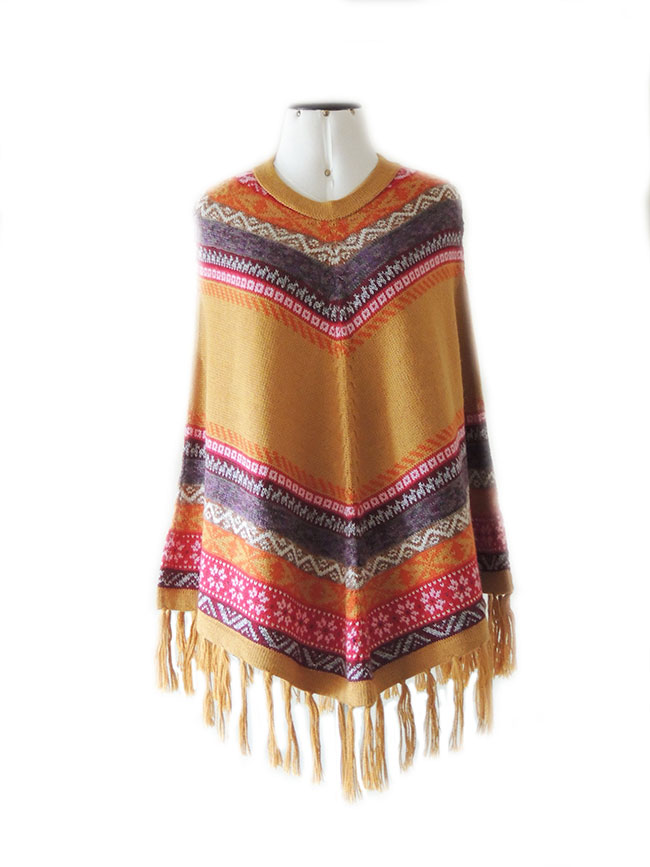 PFL cape of alpaca with fringed and ethnic patterns.