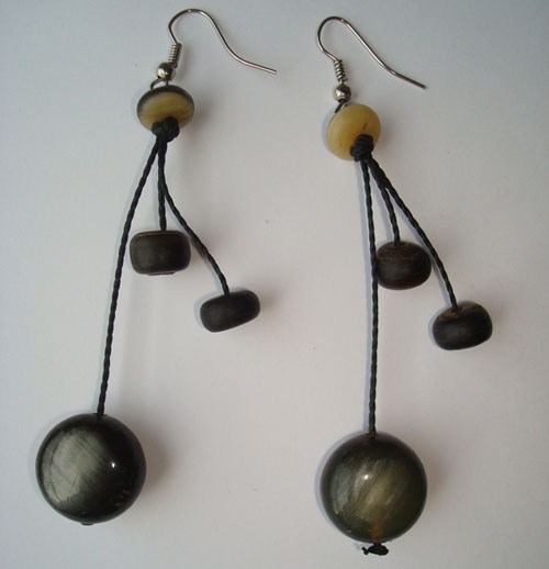 PFL Earrings, a combination of flat and round balls made from bull horn