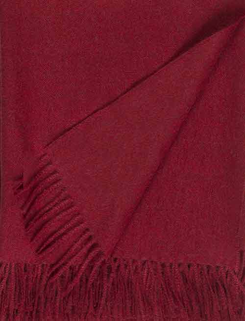 Throw 100% baby alpaca, woven solid color design with fringes.