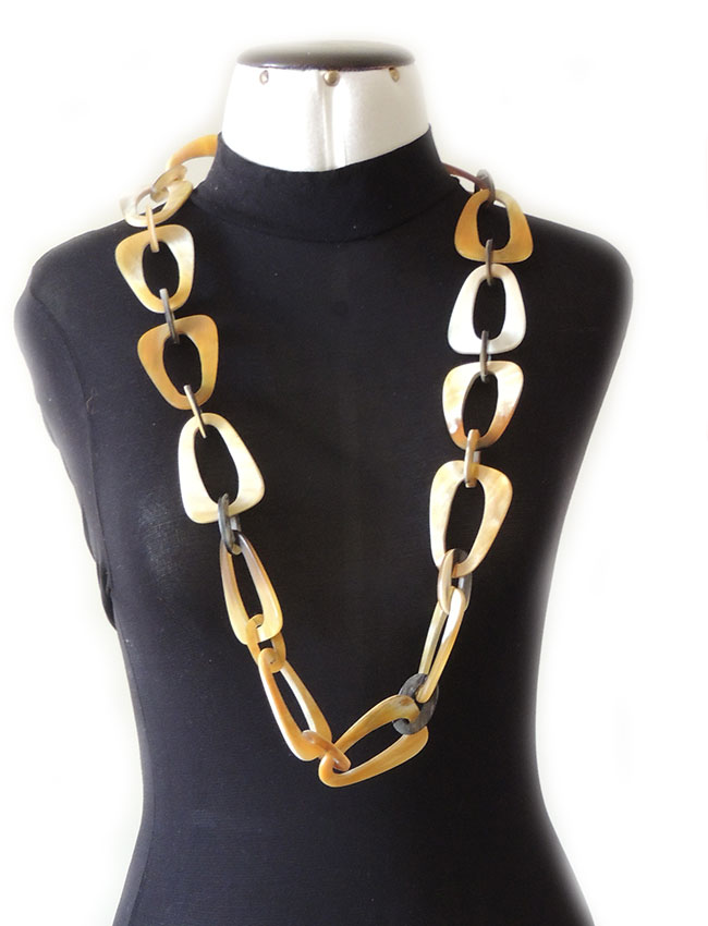 PFL necklace with triangular links with rounded corners and small oval links made from polished buffalo horn.