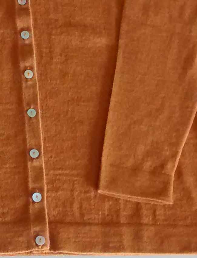 ocher with V-Neck and mother of pearl button button closure in baby alpaca