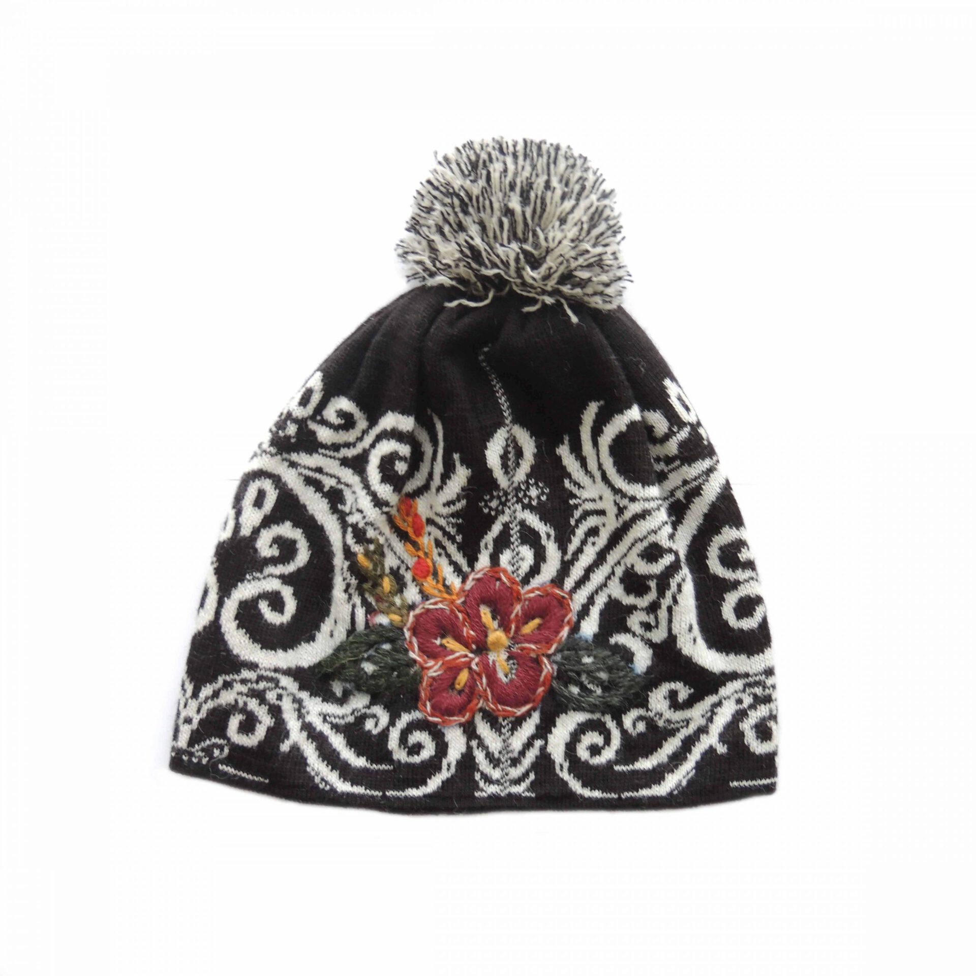 PopsFL wholesale producer PFL Knitwear jacquard knitted beanie with embroided detail and pompon.